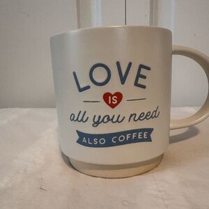 Hallmark Love Is All You Need … Also Coffee ceramic coffee mug.